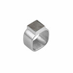 Product image of the Mondrian Ring Pyrite by Märta Larsson, displayed against a white background. The ring features a bold 9x9 mm square-cut pyrite stone set in recycled sterling silver. With a 10 mm wide band, the design blends modernist minimalism with raw elegance, making it suitable as a signet ring or a statement piece for any finger.