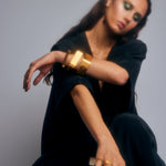 Luxury designer black kaftan dress by Märta Larsson, elegant motion and timeless style.