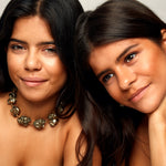 Models wearing Not A Pearl Necklace Pyrite Crystal by Märta Larsson with matching metallic accessories. Chunky pyrite crystal necklace styled for bold fashion and natural power.