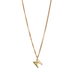 Signature Necklace by Märta Larsson in polished gold vermeil with M logo charm. Minimalist gold pendant necklace on recycled silver curb chain — handcrafted in Stockholm.