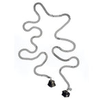 Tie Me Up Black Tourmaline Necklace by Märta Larsson in silver with rugged crystal pendants. Statement tourmaline crystal necklace with serpentine chain — edgy and expressive.