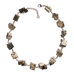 Not A Pearl Necklace Shiny Pyrite by Märta Larsson with chunky metallic pyrite stones linked by recycled sterling silver. Statement crystal necklace handcrafted in Stockholm — bold, radiant, and unforgettable.