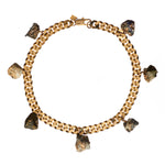 Collar Calcite Pyrite Necklace by Märta Larsson with seven raw calcite and pyrite stone charms on gold-plated chain. Statement crystal necklace handcrafted in Stockholm — bold, raw, and radiant.