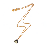 The Raw One Rough Quartz Necklace by Märta Larsson with raw clear quartz pendant on gold chain. Handcrafted crystal necklace with natural clarity and minimalist elegance.