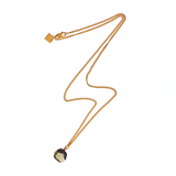 The Raw One Rough Quartz Necklace by Märta Larsson with raw clear quartz pendant on gold chain. Handcrafted crystal necklace with natural clarity and minimalist elegance.