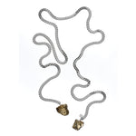 Tie Me Up Pyrite Necklace by Märta Larsson in silver with raw pyrite pendants. Pyrite crystal necklace styled for modern edge and sculptural impact.