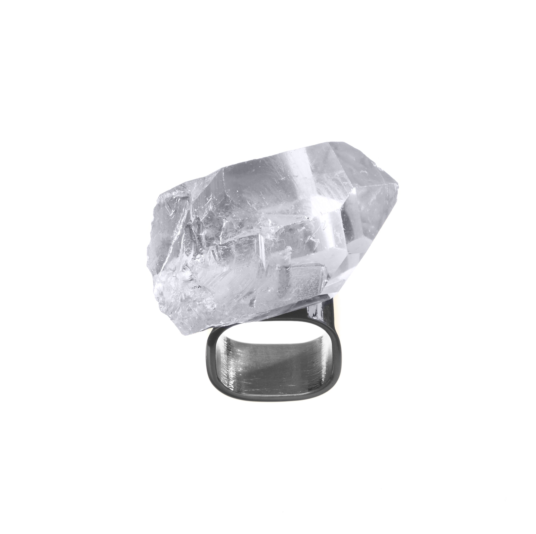 Roxx Quartz Ring by Märta Larsson in polished silver with raw quartz stone. Handcrafted crystal ring with translucent texture and bold design.