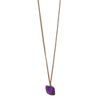 The Raw One Amethyst Necklace by Märta Larsson with raw purple crystal pendant on gold vermeil chain. Handcrafted amethyst crystal necklace — bold, modern, and naturally radiant.
