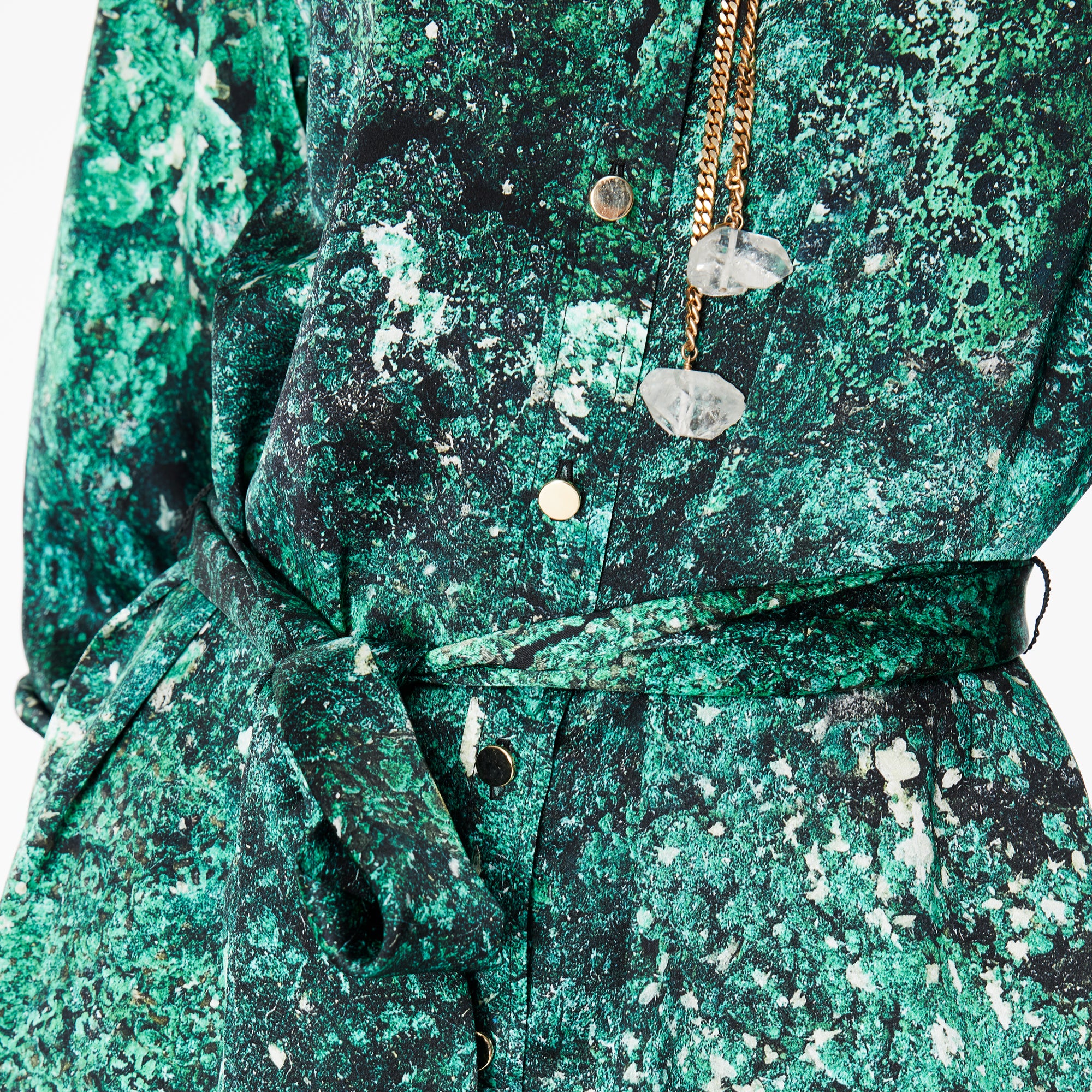 Close-up of the Glam Rock Silk Satin Shirt Dress by Märta Larsson, showing the fabric’s pattern and sheen. The silk satin texture adds depth and richness, perfect for styling as a fashion dress for women or layering with accessories.