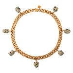 Collar Dalmatian Necklace by Märta Larsson with seven raw spotted stone charms on gold-plated collar chain. Dalmatian stone necklace handcrafted in Stockholm — bold, modern, and sculptural.