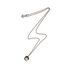 The Raw One Pyrite Octagon Necklace Silver. The Raw One Rough Quartz Necklace by Märta Larsson with translucent crystal pendant on fine metallic chain. Raw quartz necklace with natural texture — perfect for everyday clarity.