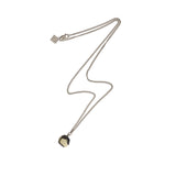 The Raw One Pyrite Octagon Necklace Silver. The Raw One Rough Quartz Necklace by Märta Larsson with translucent crystal pendant on fine metallic chain. Raw quartz necklace with natural texture — perfect for everyday clarity.
