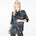 Front view of a model wearing the Boyfriend Silk Satin Shirt by Märta Larsson, photographed against a white background. This relaxed-fit shirt in 100% silk satin features a boyish collar and pocket, offering a laid-back luxury look ideal for pairing with mens fashion jewelry or designer mens jewellery.