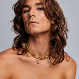 Collar Rough Quartz Necklace by Märta Larsson in gold with raw quartz stones, a bold crystal necklace with clean lines for day-to-night styling.