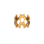  MMM brushed gold vermeil ring by Märta Larsson, featuring a bold geometric logo design and matte finish on a wide band.