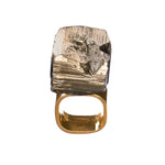Roxx Pyrite Cube Ring by Märta Larsson in gold vermeil with raw pyrite crystal. Bold cube-shaped pyrite ring with polished gold band — handcrafted statement jewelry.