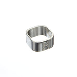  Signature Silver Ring by Märta Larsson in polished 925 sterling silver, displayed against a white background. This minimalist designer ring features a sculptural 10mm band with engraved logo — a timeless silver ring for men and women.