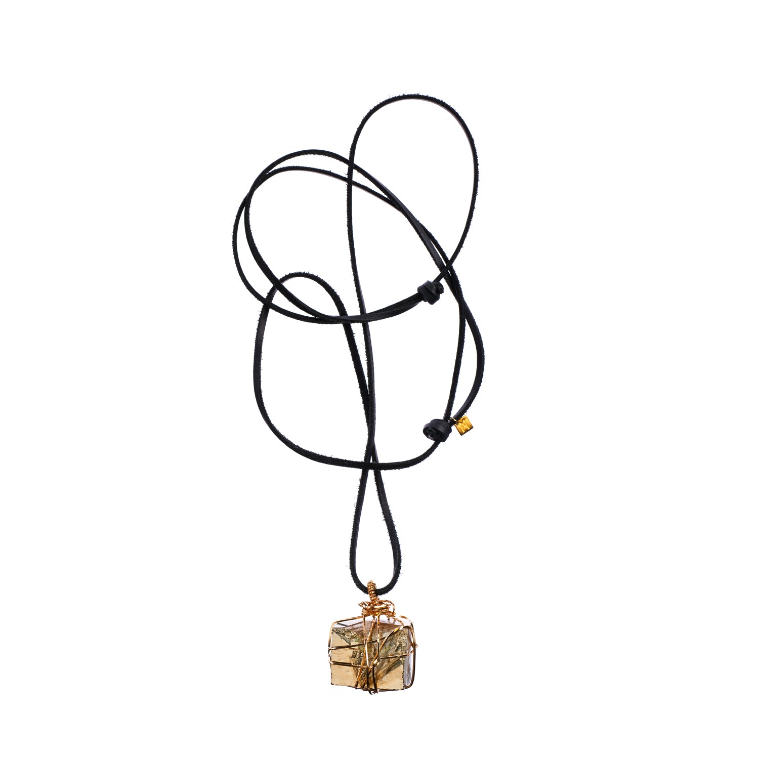 Bondage Pyrite Gold Pendant Necklace by Märta Larsson featuring a raw pyrite crystal wrapped in 14k gold wire on an adjustable leather cord.