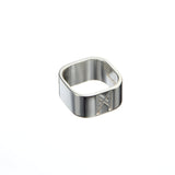 Signature Silver Ring by Märta Larsson in polished 925 sterling silver with a sculptural 10 mm engraved band, shown against a white background.