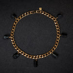 Collar Black Tourmaline Necklace by Märta Larsson in gold with rugged crystal charms, a bold natural-texture statement necklace.