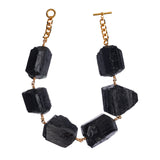 Not a Pearl Necklace XXL Black Tourmaline by Märta Larsson featuring oversized raw black tourmaline stones with 14k rolled gold and 18k gold-plated chain, bold and handcrafted.