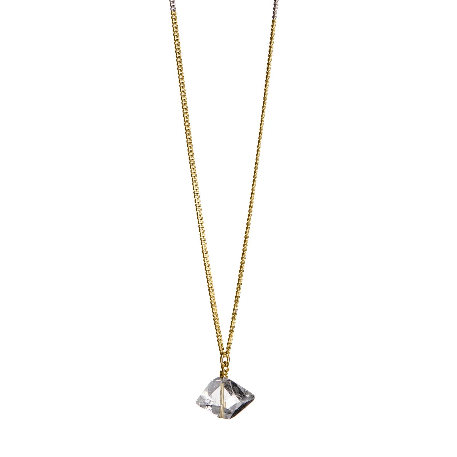 The Raw One Clear Quartz Necklace by Märta Larsson in gold with faceted quartz pendant, a geometric crystal necklace for everyday refinement.