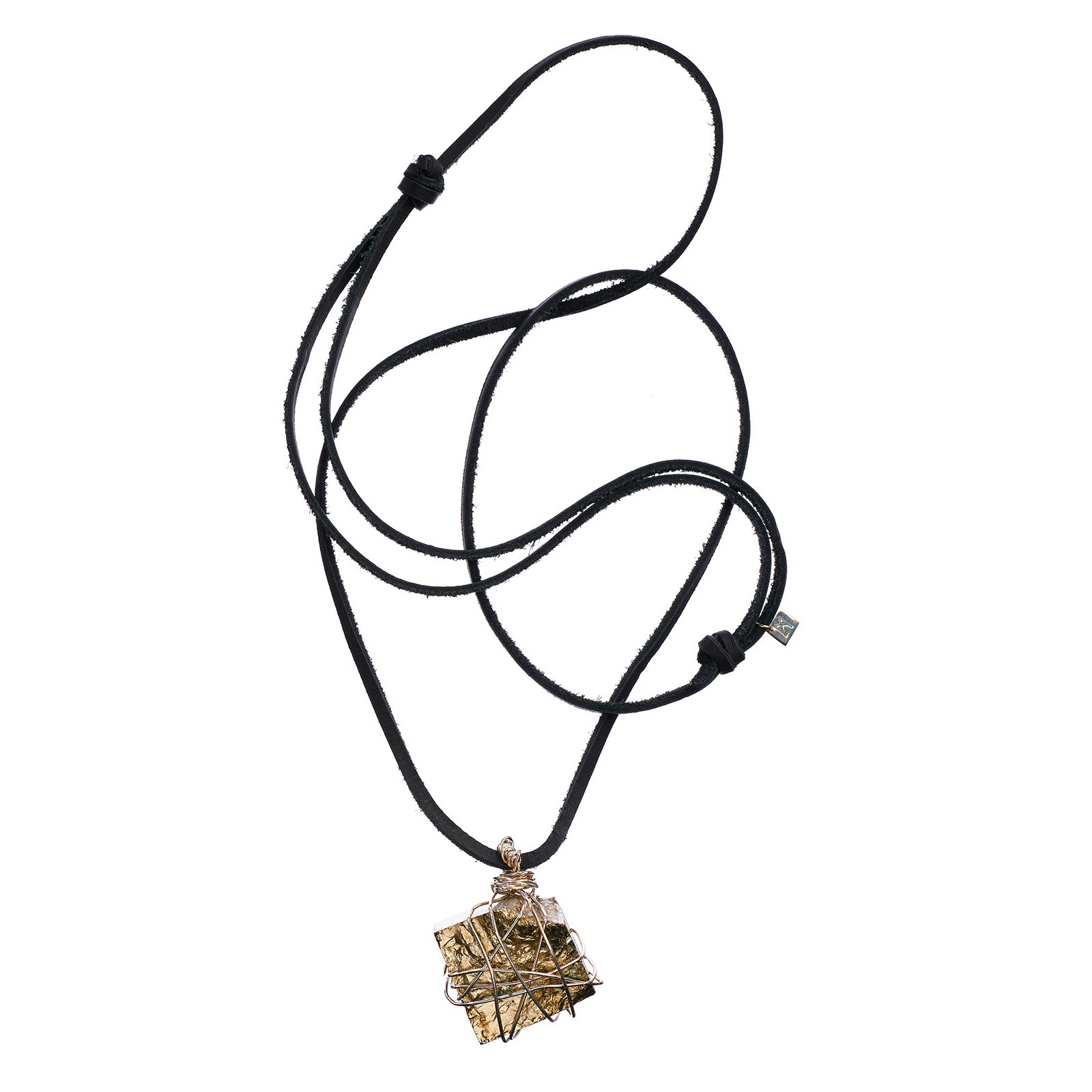 Bondage Pyrite Silver Pendant Necklace by Märta Larsson featuring a raw pyrite crystal wrapped in silver wire on an adjustable leather cord.