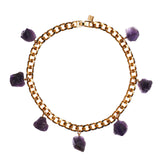 Collar Amethyst Necklace by Märta Larsson featuring seven raw purple amethyst stones on a gold-plated collar chain, bold and sculptural.