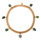 Collar Ruby Zoisite Necklace by Märta Larsson featuring seven raw ruby-zoisite stones on a gold-plated collar chain, bold and sculptural.