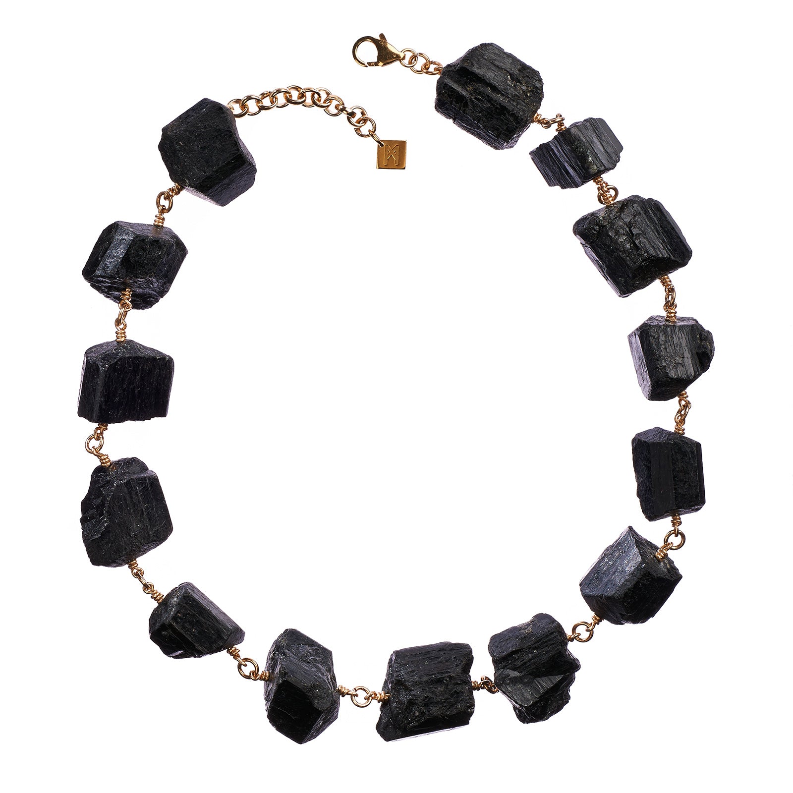 Not A Pearl Necklace Black Tourmaline by Märta Larsson with chunky raw black tourmaline stones linked by 14k rolled gold. Statement crystal necklace handcrafted in Stockholm — bold, protective, and unforgettable.