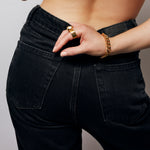 Gold vermeil Power Ring by Märta Larsson worn on the index finger, featuring a raw sculptural stone for bold everyday style