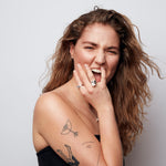  Statement ring in recycled silver by Märta Larsson, featuring a thick band and asymmetrical stone for a brutalist aesthetic.