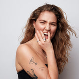  Statement ring in recycled silver by Märta Larsson, featuring a thick band and asymmetrical stone for a brutalist aesthetic.