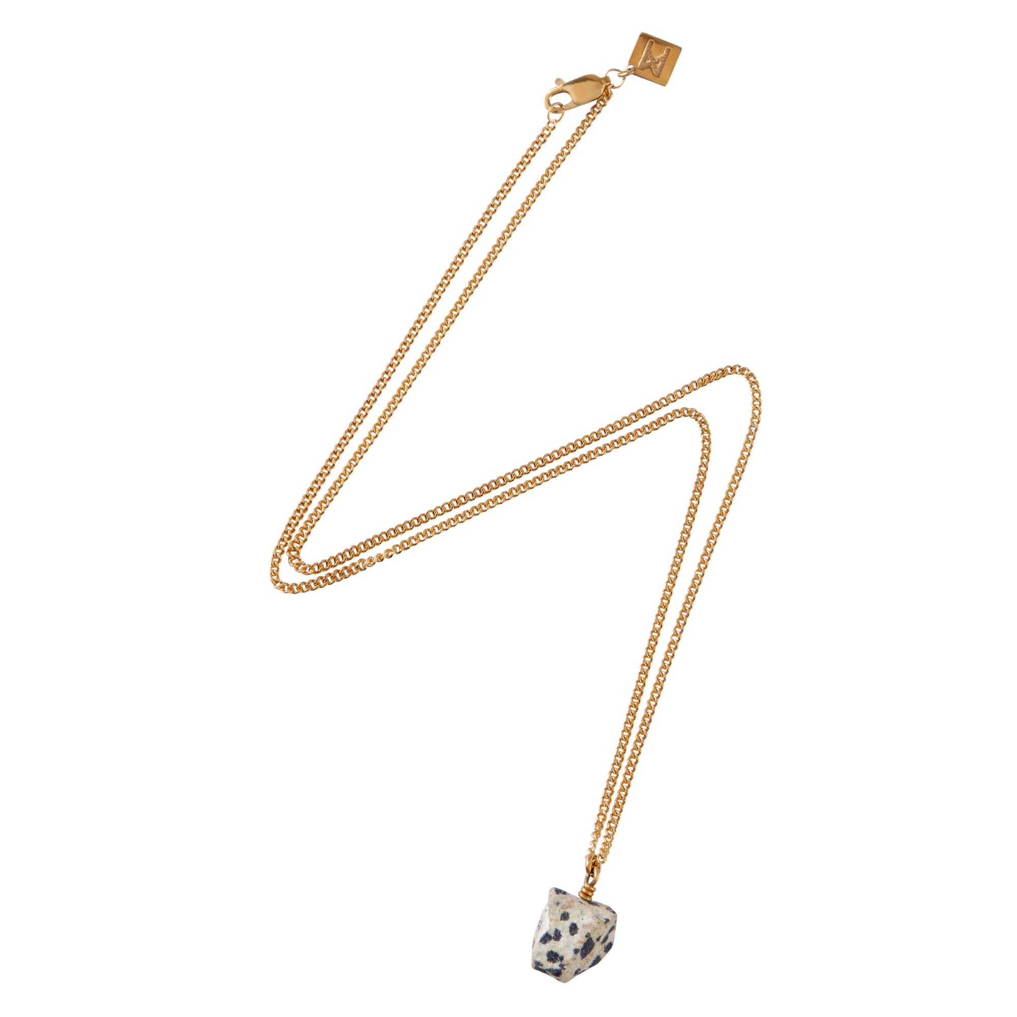 The Raw One Dalmatian Necklace by Märta Larsson with raw spotted stone on a gold-vermeil chain, a bold modern handcrafted pendant.