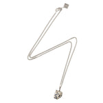 The Raw One Dalmatian Necklace by Märta Larsson in silver with speckled gemstone pendant, a raw stone necklace with a minimalist chain.