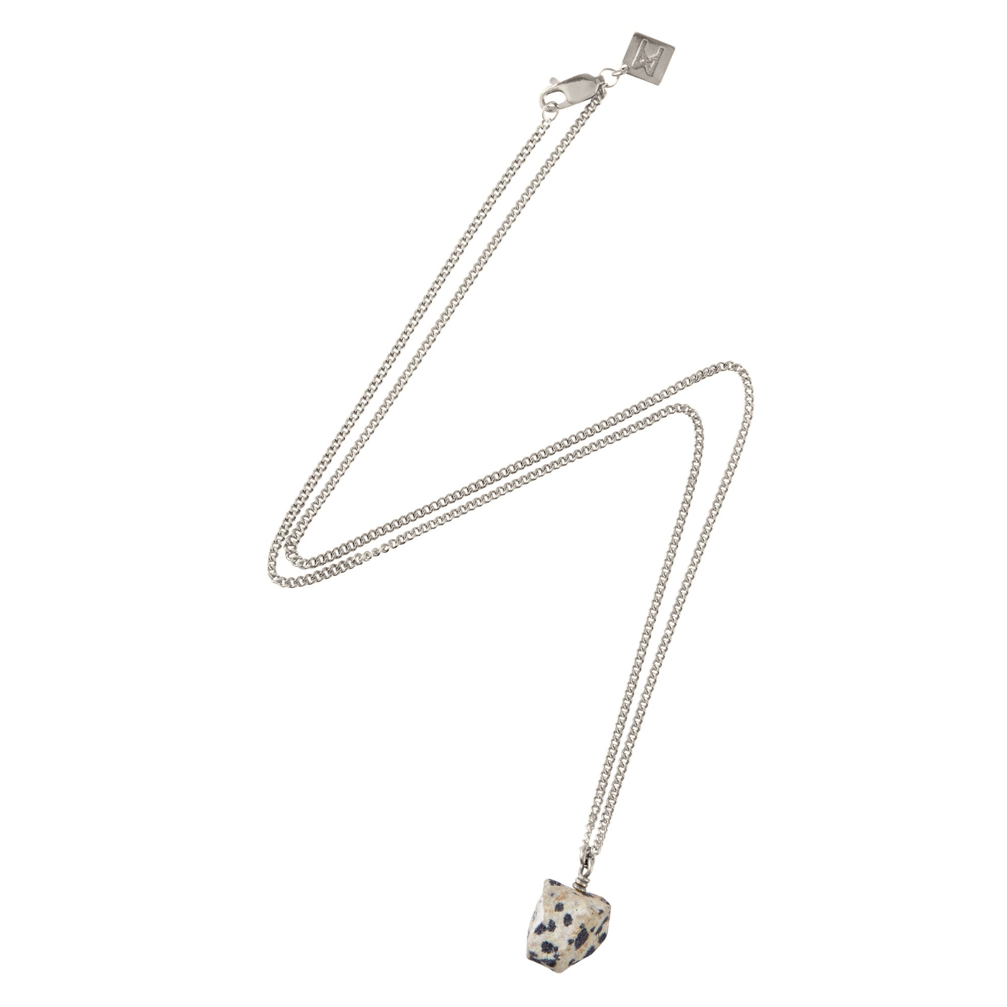 The Raw One Dalmatian Necklace by Märta Larsson in silver with speckled gemstone pendant, a raw stone necklace with a minimalist chain.