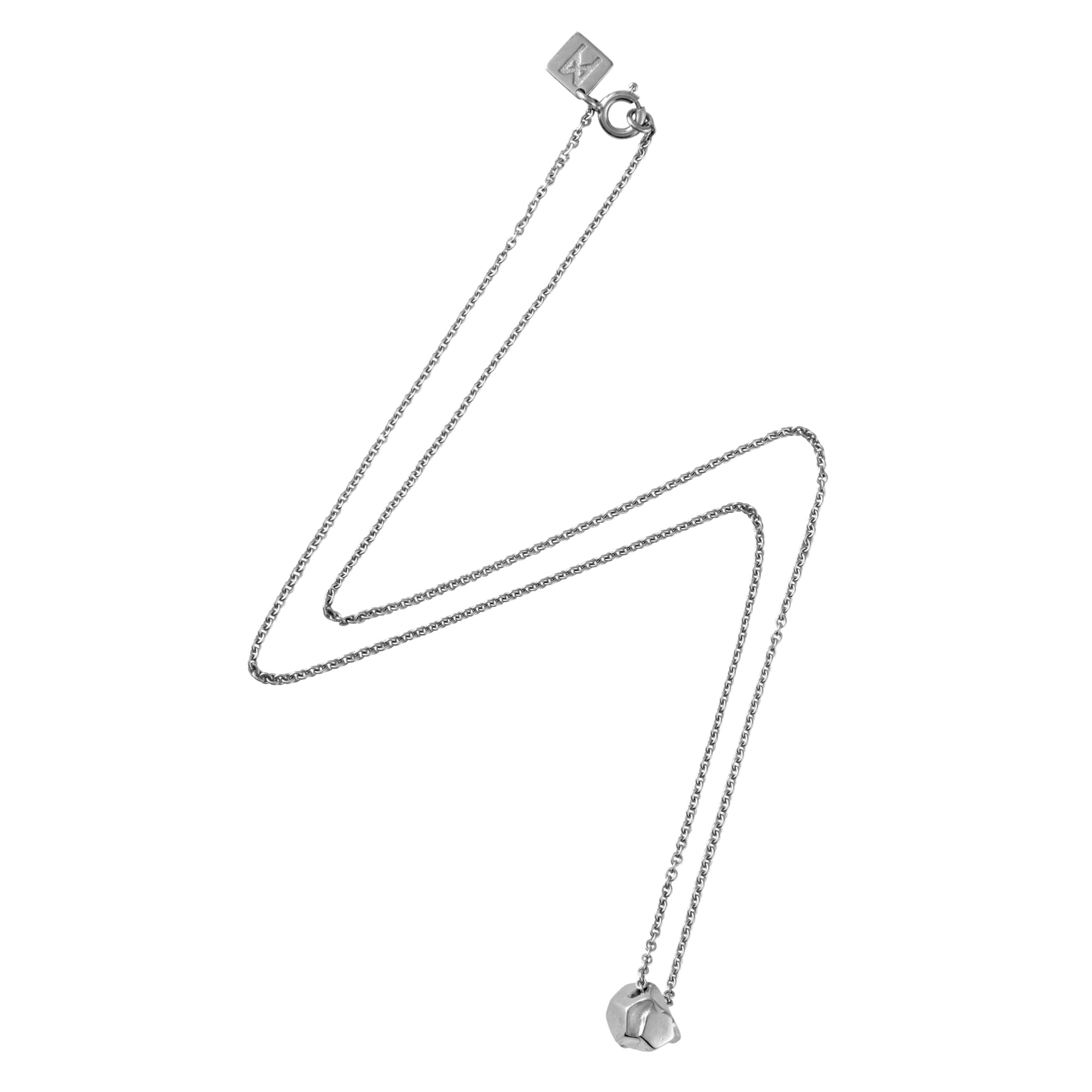 Rolling Stone Necklace by Märta Larsson in recycled 925 sterling silver, a minimalist raw stone pendant crafted with natural texture in Stockholm.