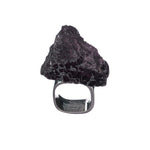 Roxx Black Tourmaline Asymmetrical Ring by Märta Larsson in polished silver, an asymmetrical raw black tourmaline crystal set in recycled sterling silver on white background.