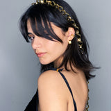 Model with gold chain headpiece styled from the Gold Chain Belt & Necklace by Märta Larsson, a bold avant-garde statement chain.