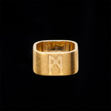 Product image of the Signature Brushed Gold Ring by Märta Larsson in brushed 24 carat gold vermeil with wide matte band against a black background.