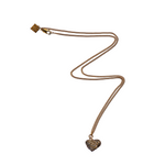 The Raw One Calcite Pyrite Necklace by Märta Larsson with a raw calcite-pyrite crystal on a gold-vermeil chain, handcrafted in Stockholm.