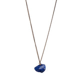The Raw One Lapis Lazuli Necklace by Märta Larsson with raw ultramarine crystal on a gold-vermeil chain — bold, sculptural, handcrafted.
