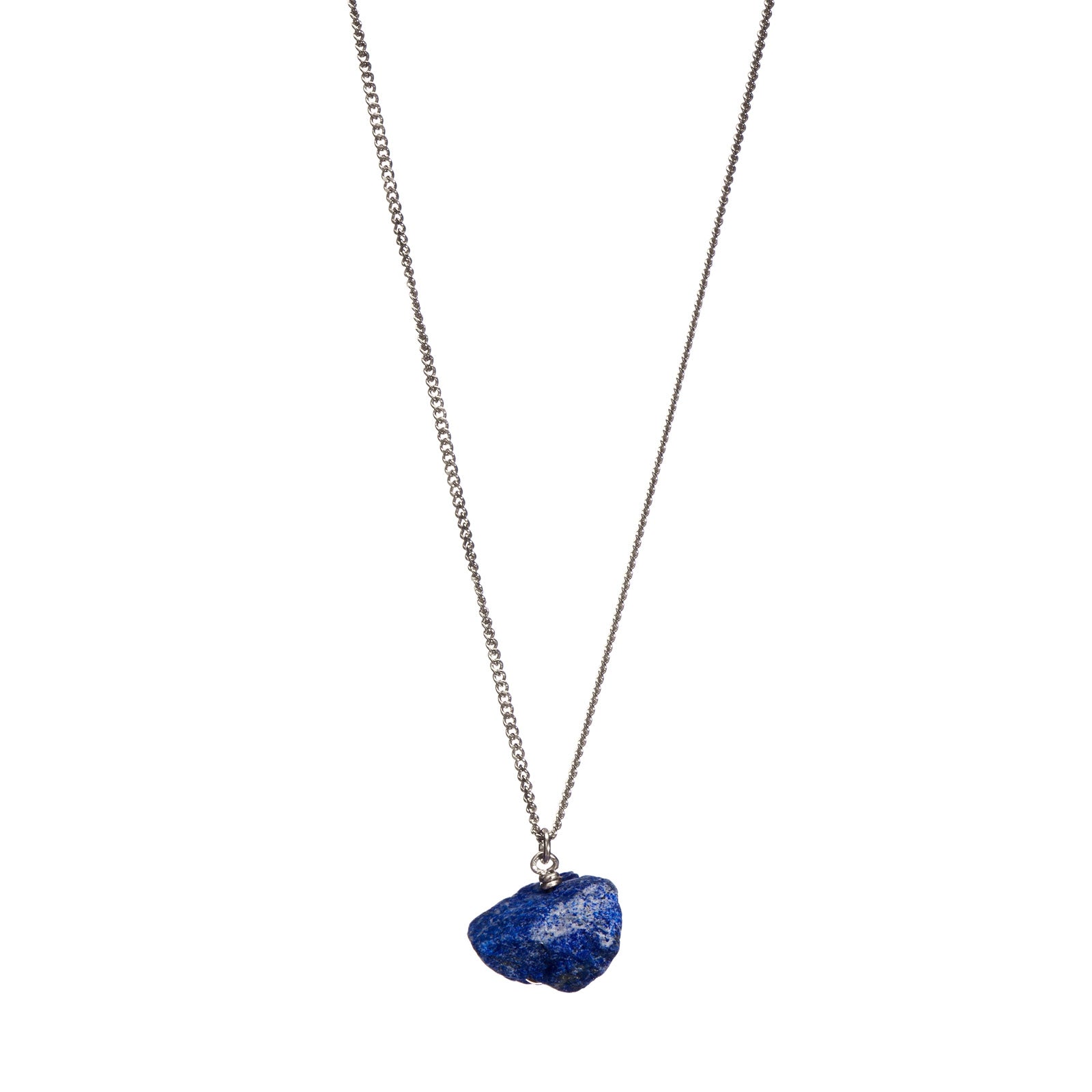 The Raw One Lapis Lazuli Necklace by Märta Larsson in silver with a rough blue crystal pendant, a minimalist naturally radiant piece.