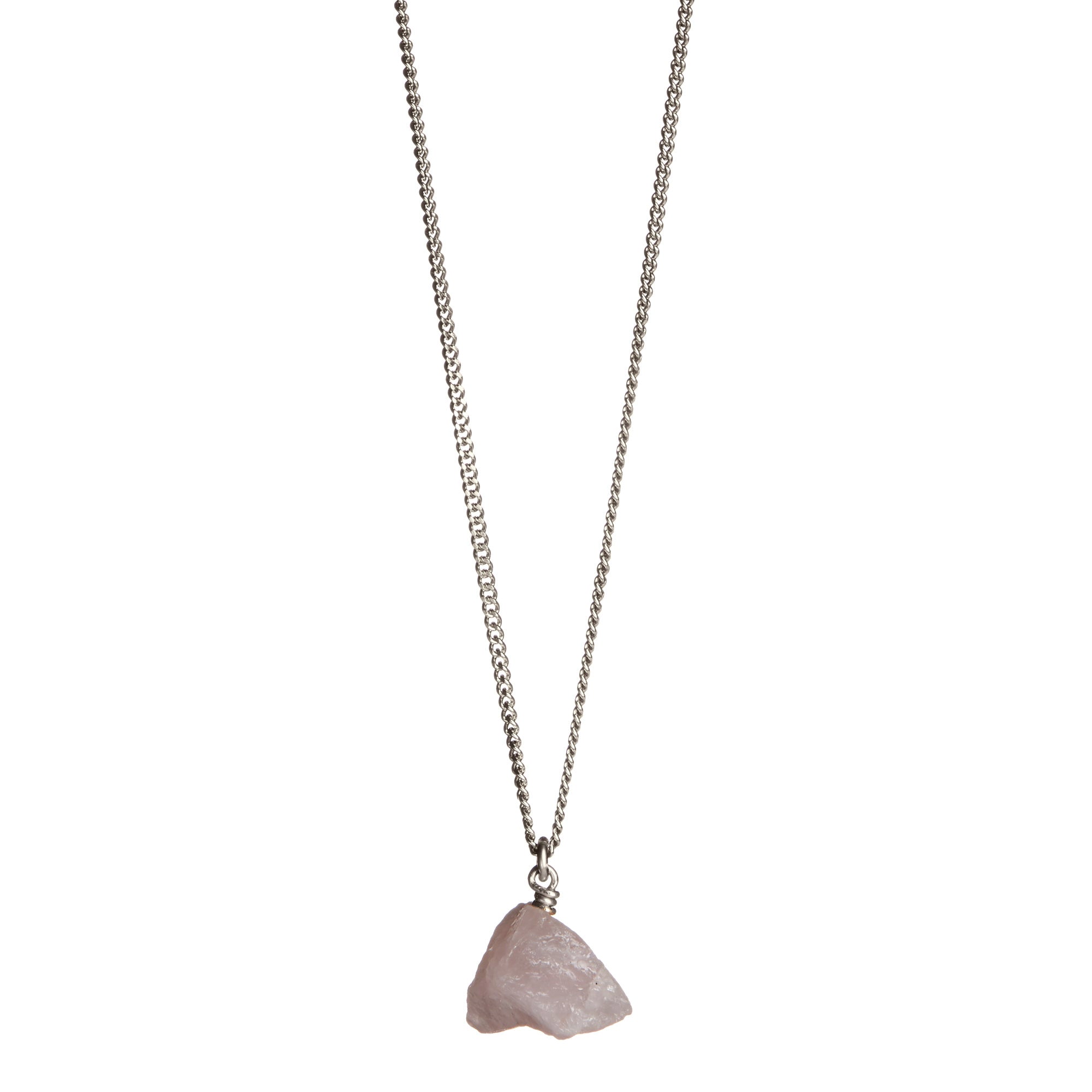 The Raw One Rose Quartz Necklace by Märta Larsson in silver with raw pink crystal pendant, a minimalist rose quartz piece with natural texture.