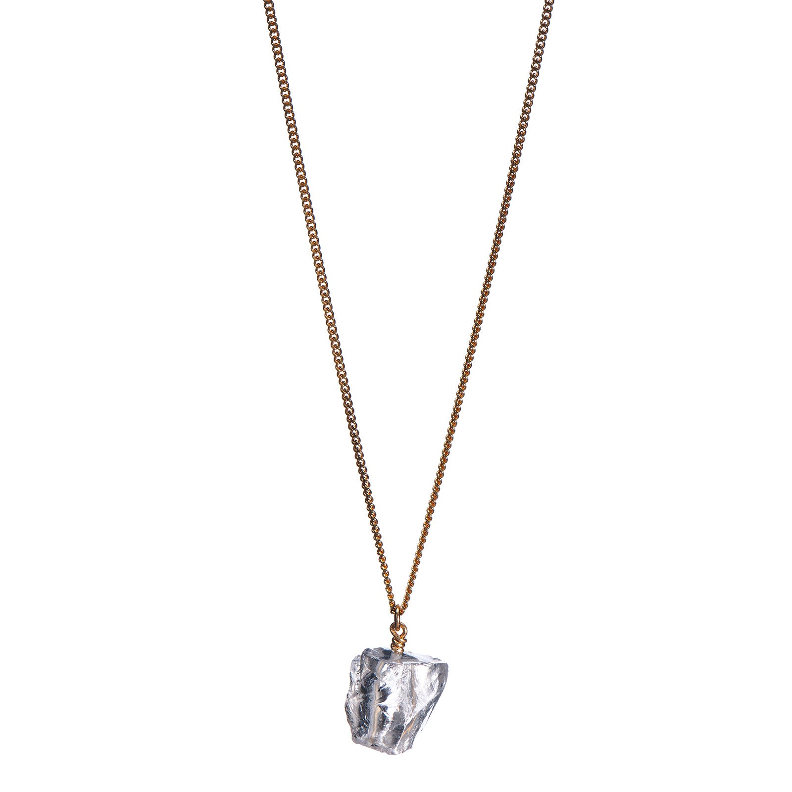 The Raw One Rough Quartz Necklace by Märta Larsson with raw clear quartz on a gold chain, a handcrafted crystal piece with natural clarity.