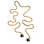Tie Me Up Black Tourmaline Necklace by Märta Larsson with raw crystal pendants on a gold-plated lariat chain — bold handcrafted statement design.