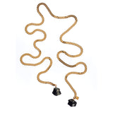 Tie Me Up Black Tourmaline Necklace by Märta Larsson with raw crystal pendants on a gold-plated lariat chain — bold handcrafted statement design.