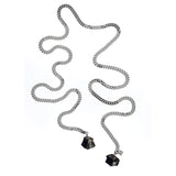Tie Me Up Black Tourmaline Necklace by Märta Larsson in silver, a rugged raw tourmaline pendant necklace on a serpentine chain for edgy modern style.