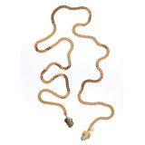 Tie Me Up Calcite Pyrite Necklace by Märta Larsson with raw quartz pendants on a gold-plated lariat chain, a bold sculptural handcrafted piece.